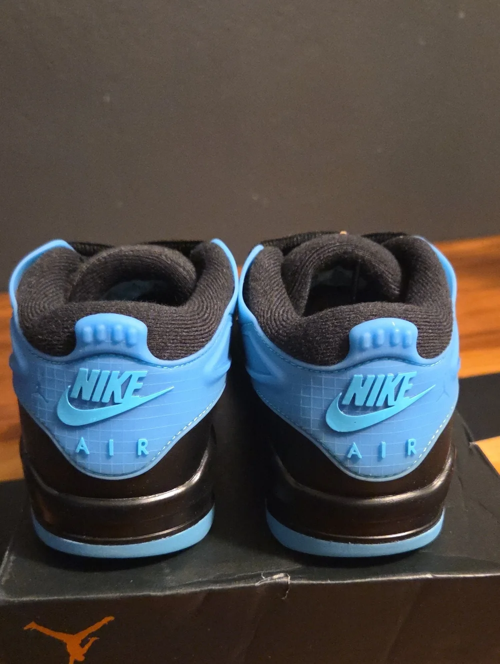 Air Jordans 4RM - Black and Gamma Blue Size 4 Youth